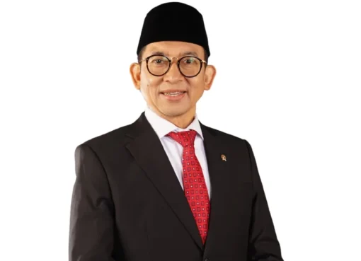 Culture Minister Fadli Zon speaking at the Cannes Film Festival with a determined expression.