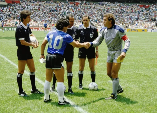 A vibrant football stadium from the 1986 World Cup, showing players in action with a crowd cheering.
