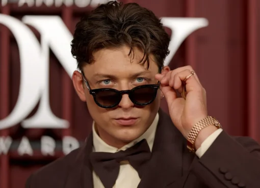Tom Francis, a young British actor, looking sharp, possibly as the next James Bond.