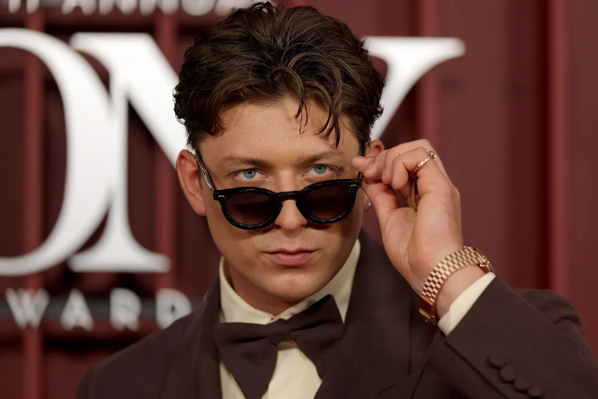 Tom Francis, a young British actor, looking sharp, possibly as the next James Bond.