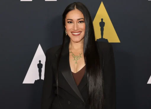 Actress Q'orianka Kilcher, with a backdrop of 'Avatar' and Disney imagery.