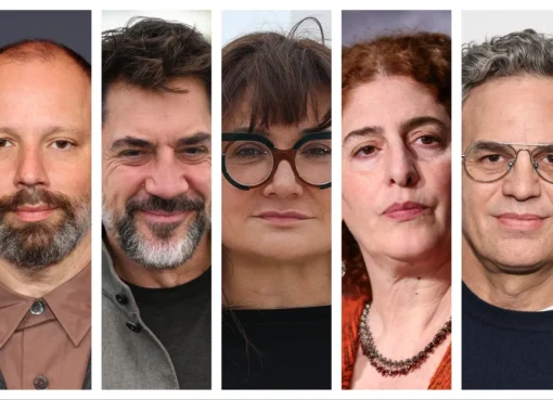 A group of diverse filmmakers and actors, including Javier Bardem and Mark Ruffalo, signing an important open letter against media control.
