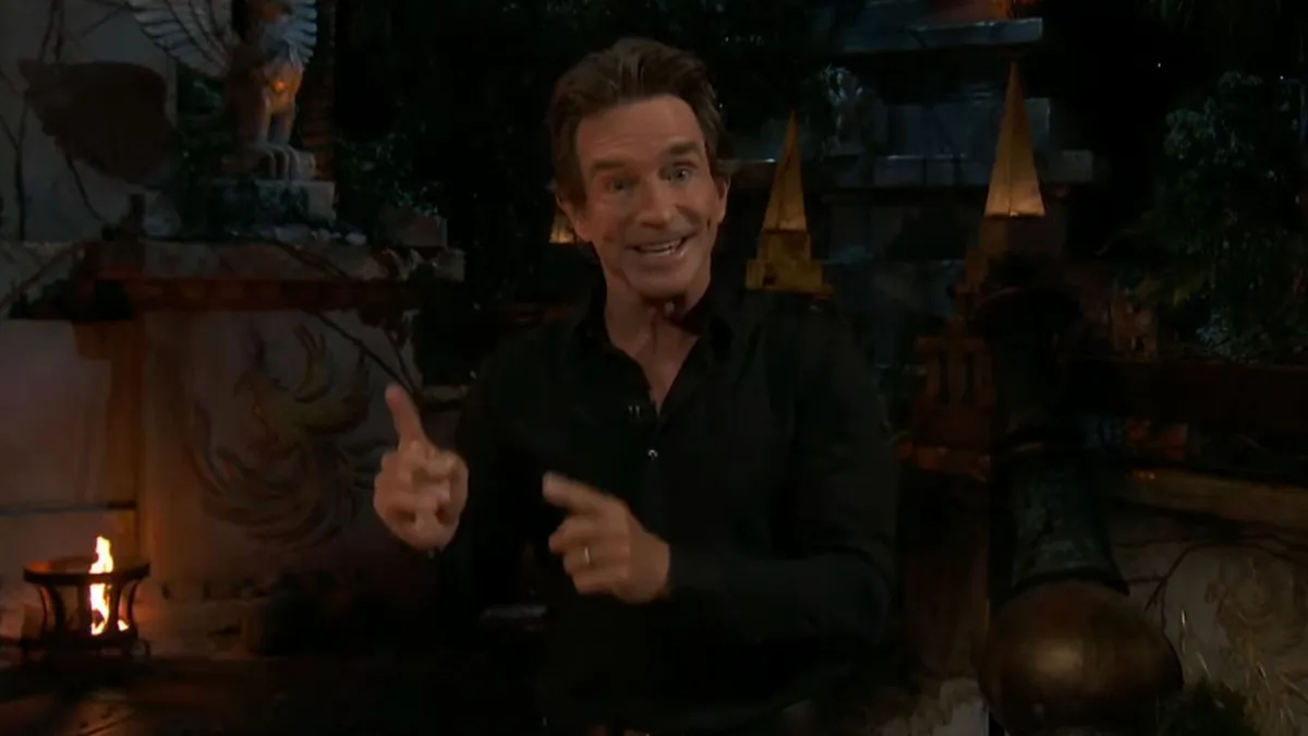 Jeff Probst looking surprised during a live television broadcast