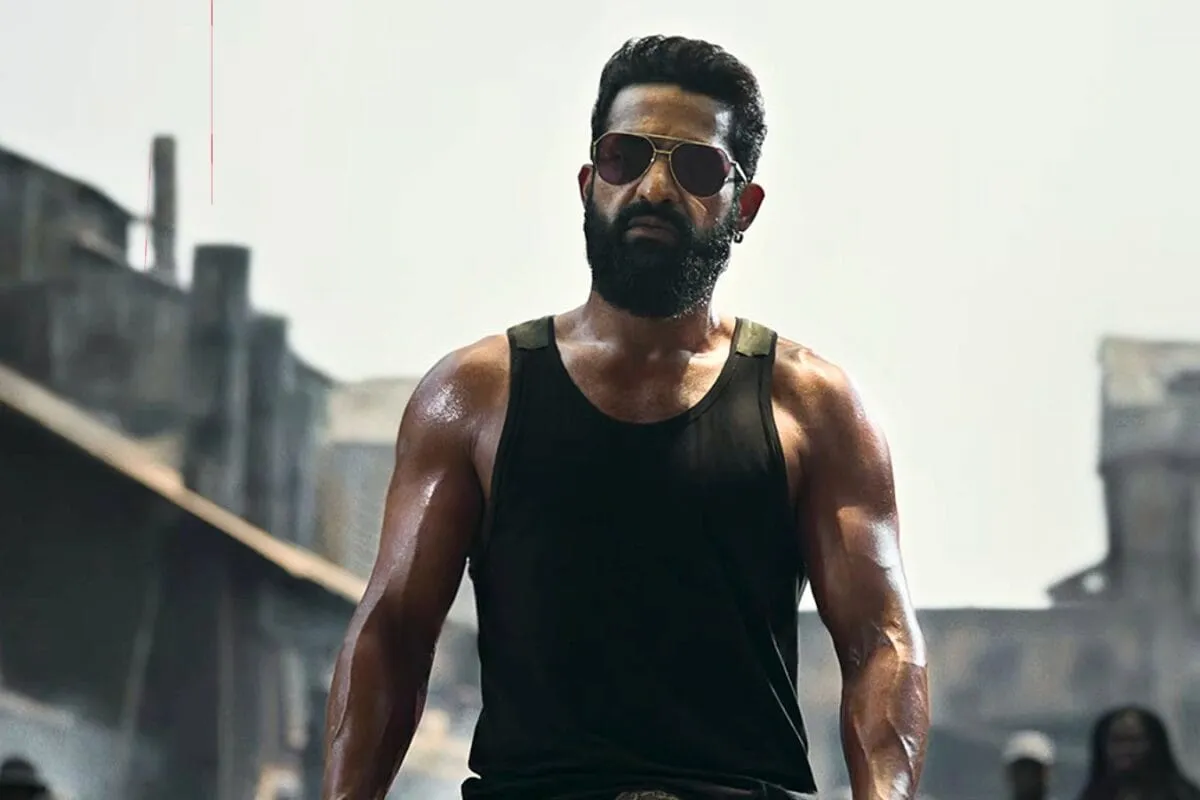 A gritty and dark movie poster for the film Dragon starring Jr NTR