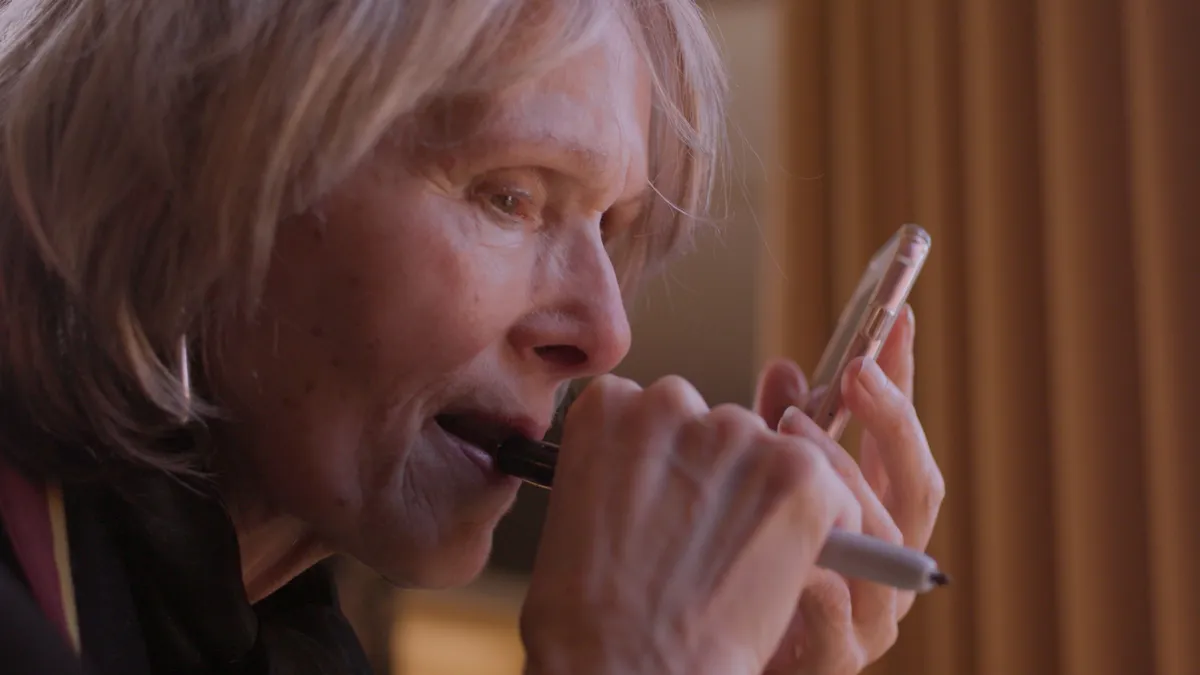 Director Ivy Meeropol speaking, with a serious expression.