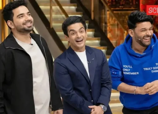 Kapil Sharma and Samay Raina looking serious on a stage with studio lights.