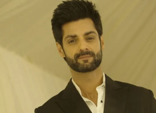Actor Karan Wahi making a thoughtful expression, perhaps pondering a difficult decision.