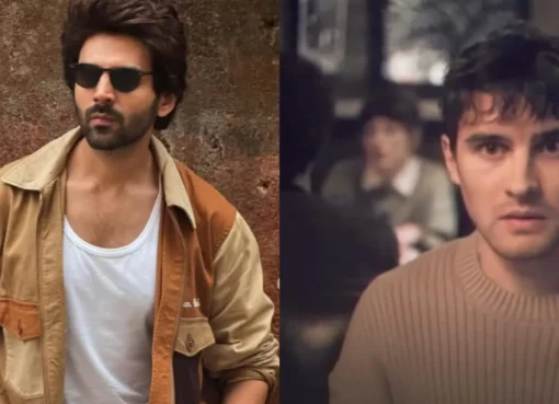 Kartik Aaryan smiling, possibly in a movie scene.