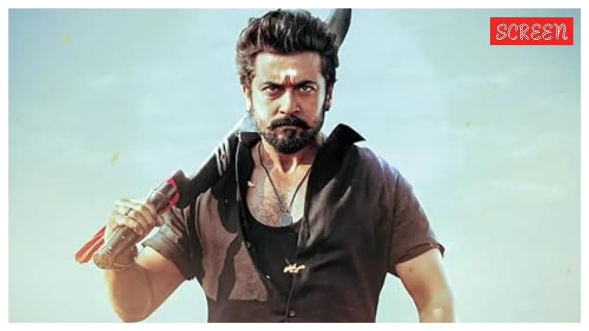 Suriya smiling in a movie still from Kanguva.