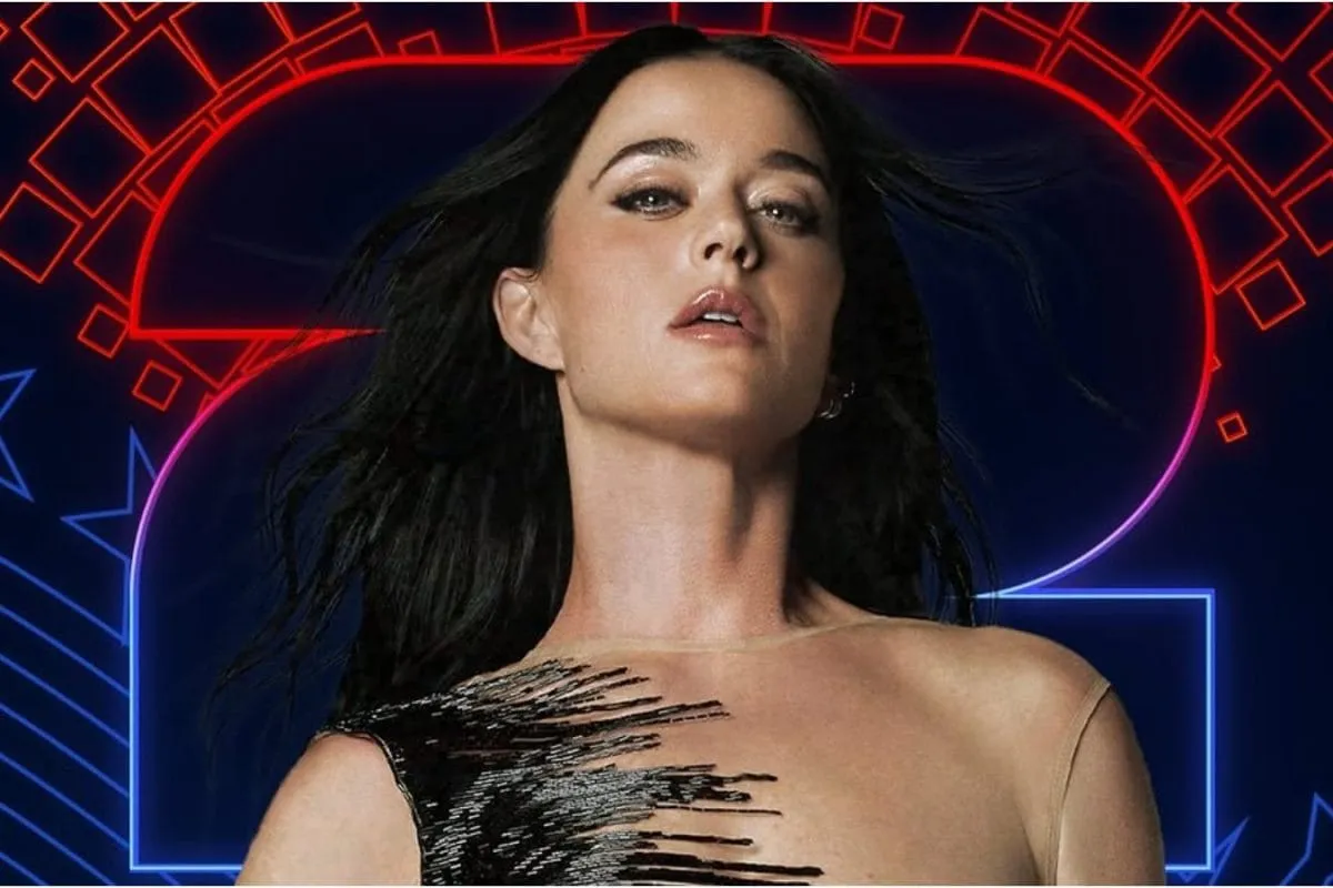 Katy Perry smiling on stage, perhaps performing
