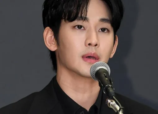 Kim Soo-Hyun looking serious and determined in a tailored suit.