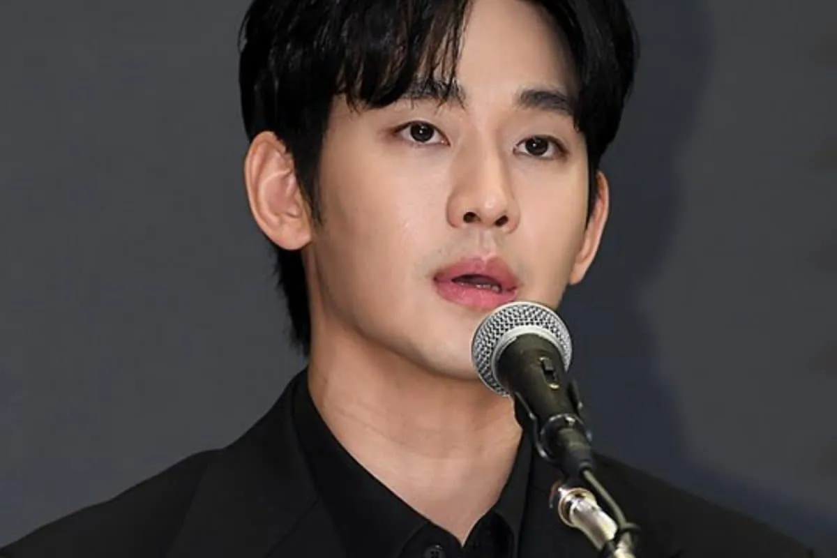 Kim Soo-Hyun looking serious and determined in a tailored suit.