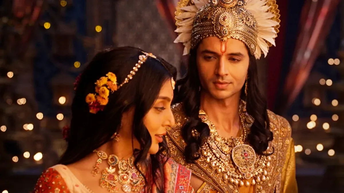 Siddharth Gupta and Sanskruti Jayana smiling and posing for a photo.