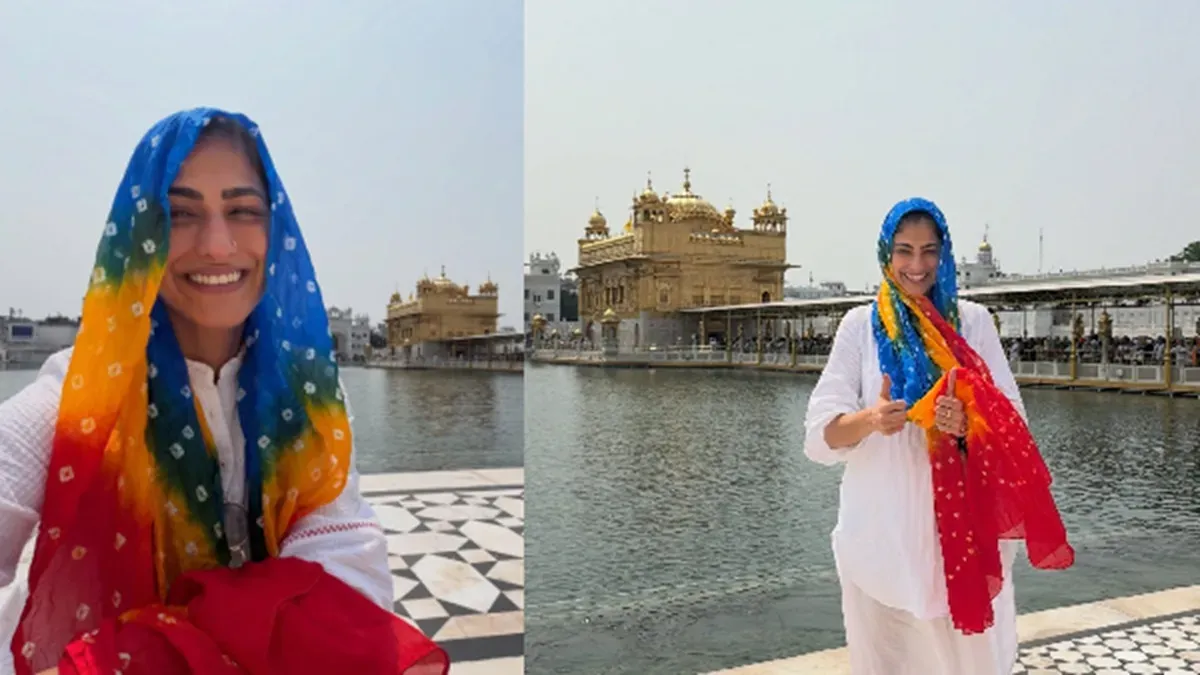 Kubbra Sait smiling serenely at the Golden Temple in Amritsar, with the golden shrine in the background.