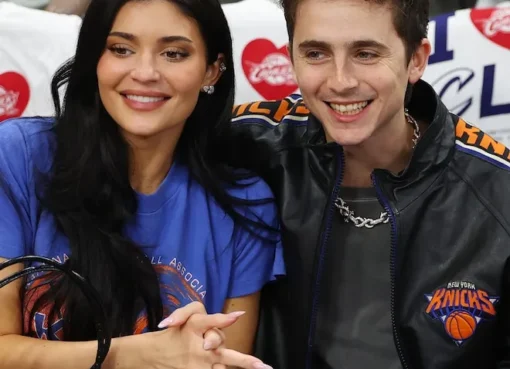 Kylie Jenner and Timothée Chalamet showing affection at a New York Knicks basketball game.