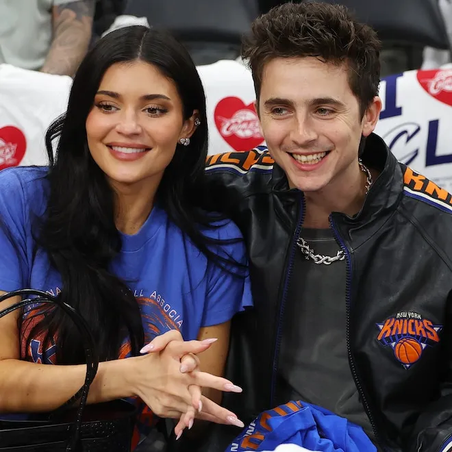 Kylie Jenner and Timothée Chalamet showing affection at a New York Knicks basketball game.