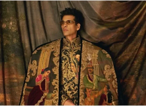 Karan Johar posing at the Met Gala in a Manish Malhotra outfit