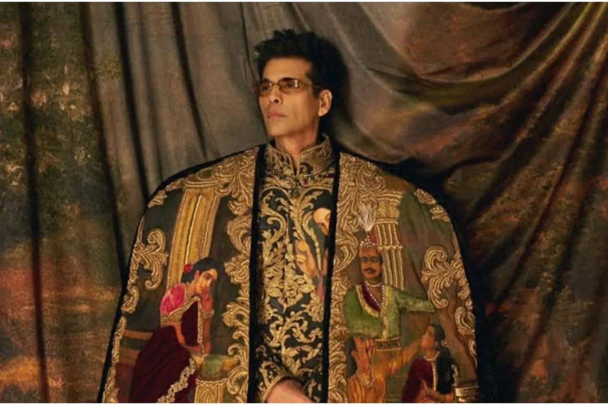 Karan Johar posing at the Met Gala in a Manish Malhotra outfit