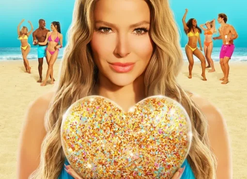 A couple holding hands on a sunny beach, with the Love Island logo.