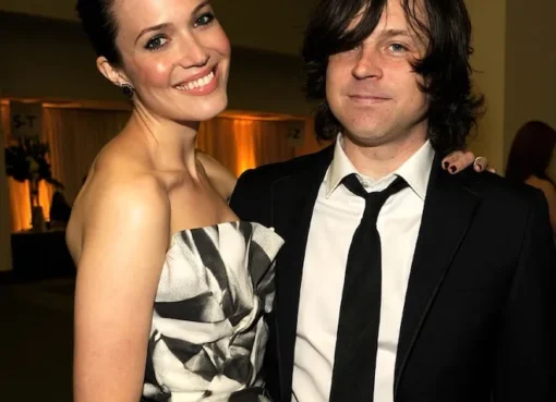 Mandy Moore smiling and looking thoughtful.