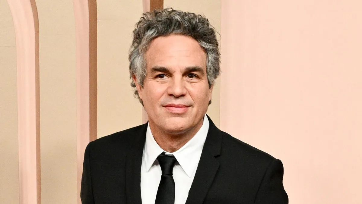 Mark Ruffalo looking concerned, perhaps in a dimly lit room.