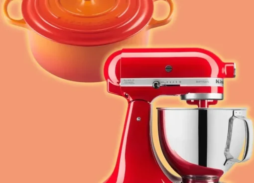 A colorful KitchenAid stand mixer next to a red Le Creuset Dutch oven.