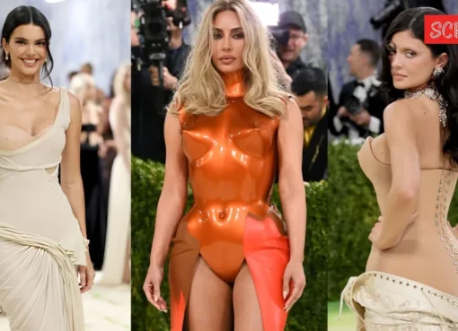 Kim, Kylie, and Kendall Jenner posing on the Met Gala red carpet.