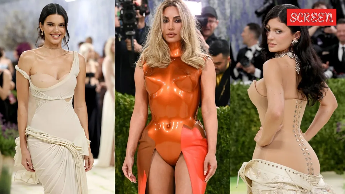 Kim, Kylie, and Kendall Jenner posing on the Met Gala red carpet.