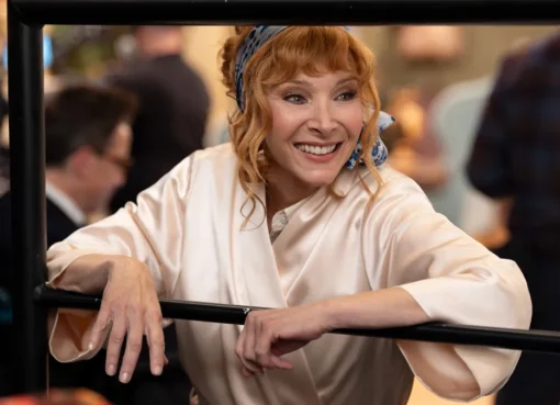 Valerie Cherish looking into a camera lens with a worried expression