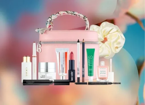 A collection of luxury beauty products from the Bluemercury Spring Makeup Edit neatly arranged on a clean white background.