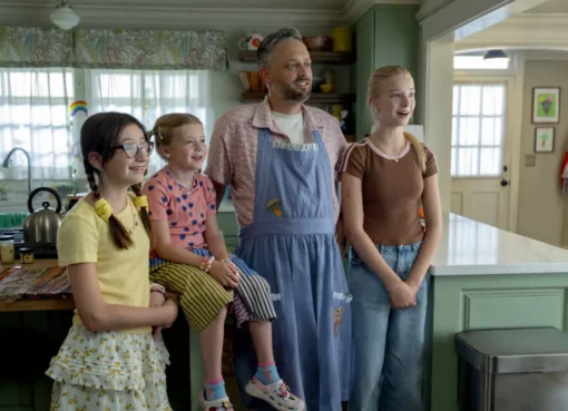 Nate Bargatze looking confused in a movie scene.