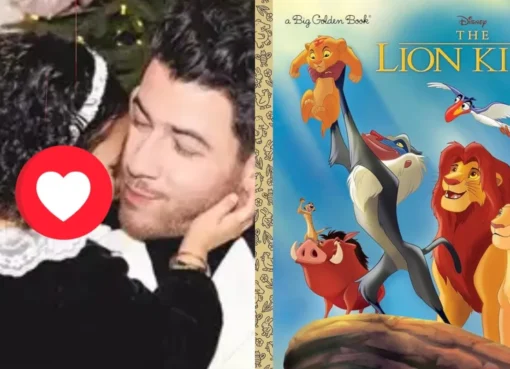 Nick Jonas smiling while holding his daughter Malti