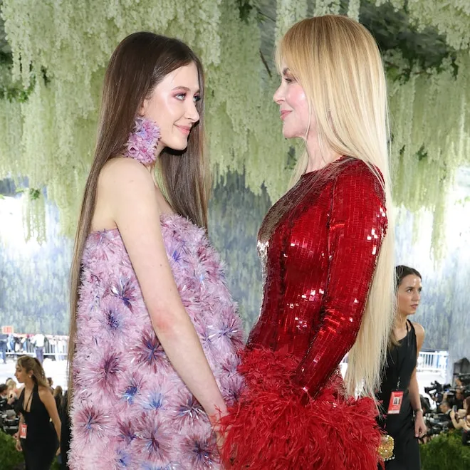 Nicole Kidman and her daughter Sunday Rose posing on the Met Gala red carpet.