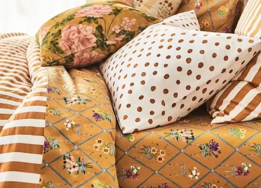 A collection of stylish Anthropologie home decor items on sale.