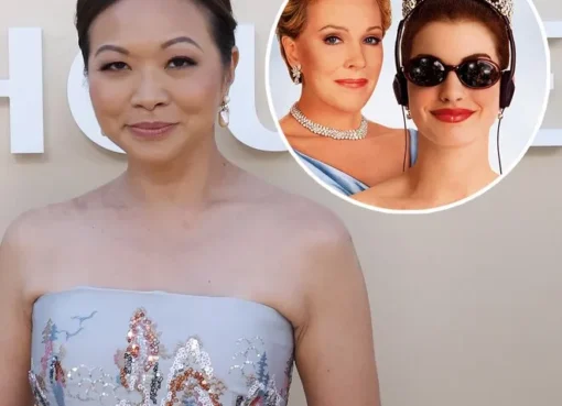 Anne Hathaway wearing a crown and sunglasses in Princess Diaries