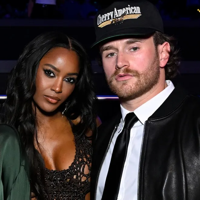 Ciara Miller and West Wilson standing close together during a summer party.