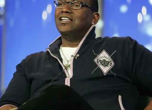 Randy Jackson smiling on the set of American Idol for a reunion