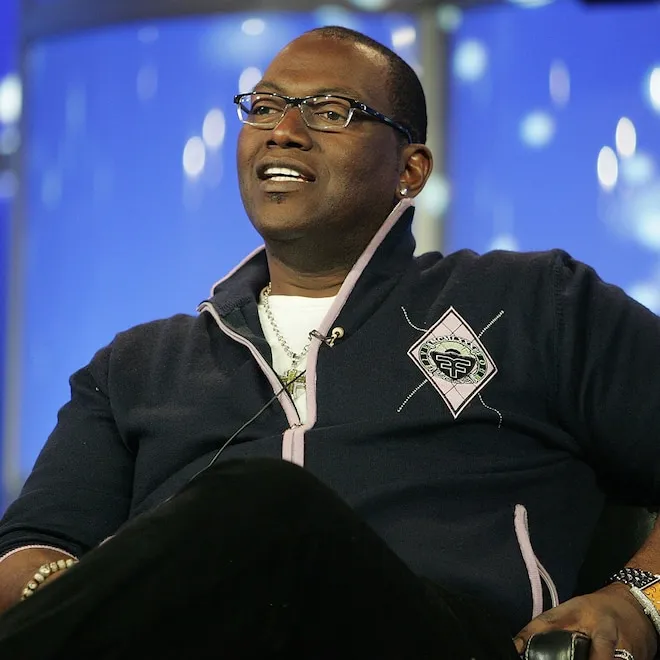 Randy Jackson smiling on the set of American Idol for a reunion
