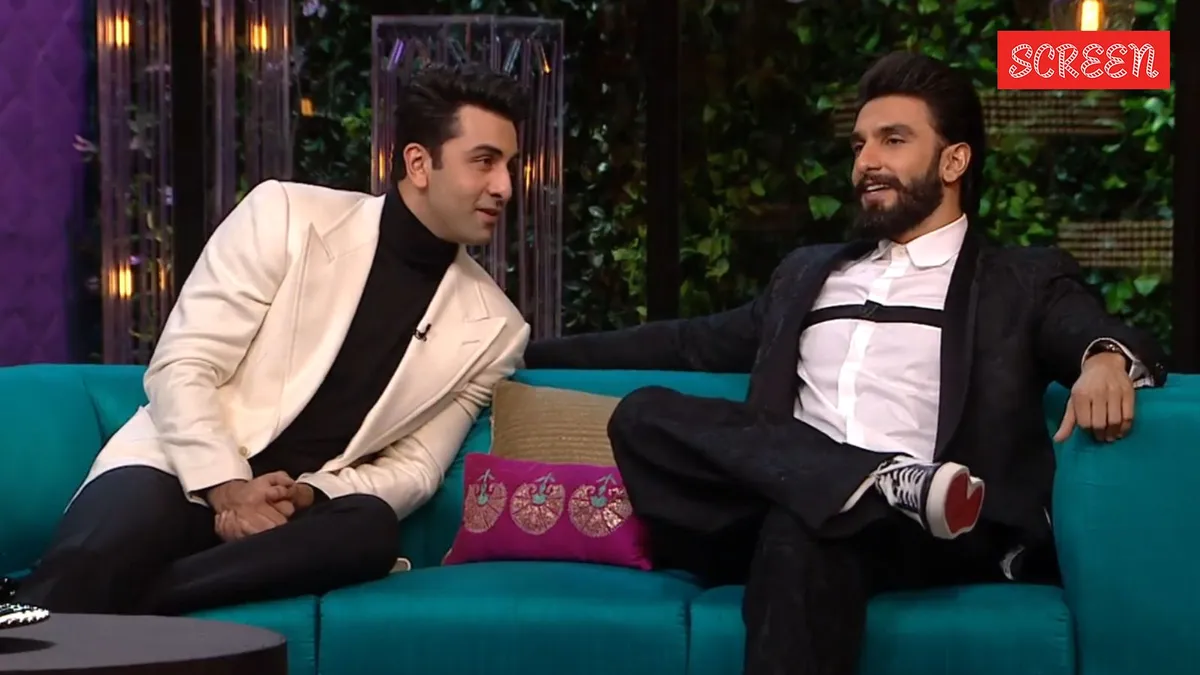 Ranveer Singh smiling and making a funny face.