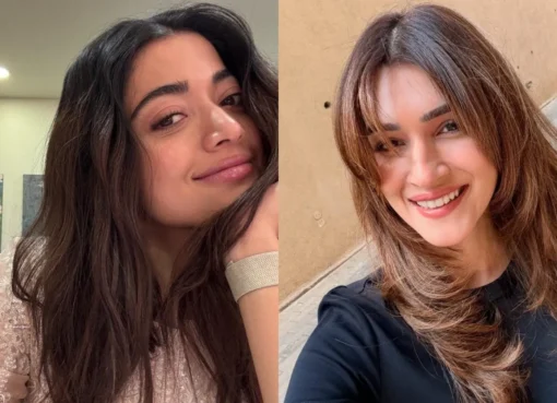 Rashmika Mandanna and Kriti Sanon laughing at a Bollywood event