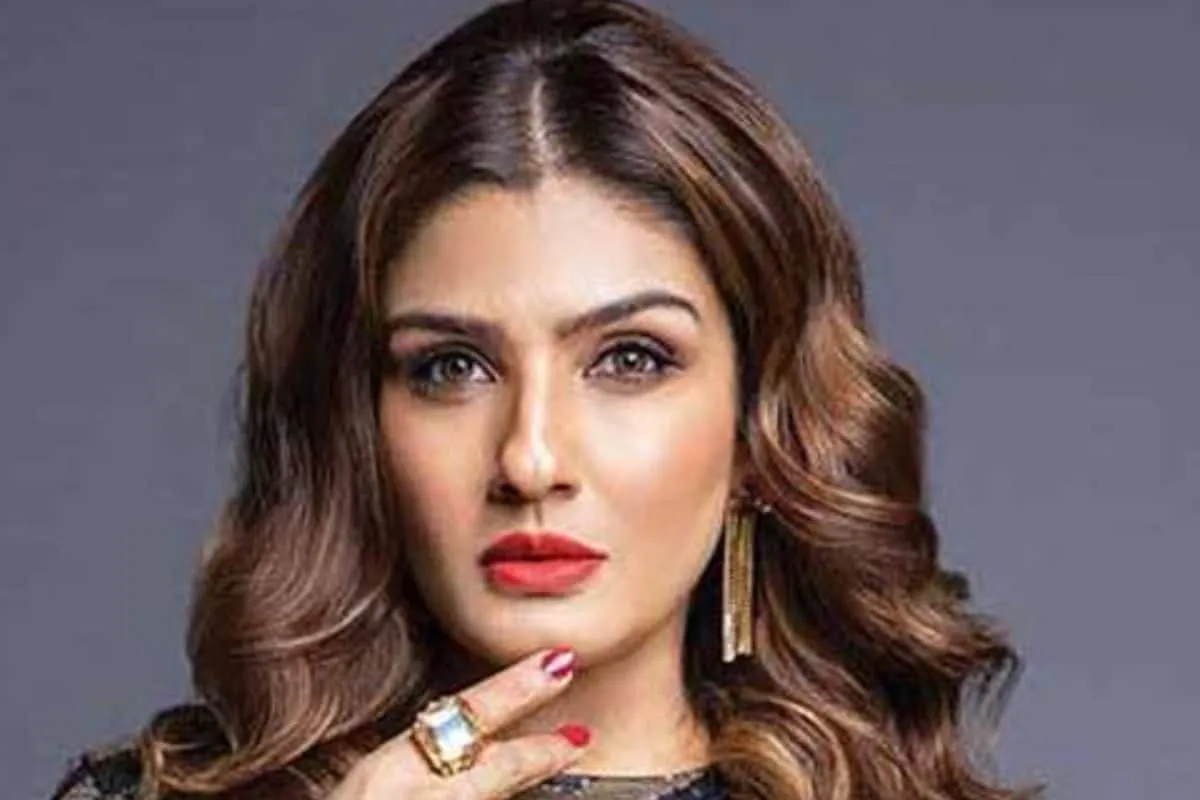 Raveena Tandon looking serious and determined.