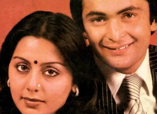 A vintage style photo of Neetu and Rishi Kapoor smiling together.