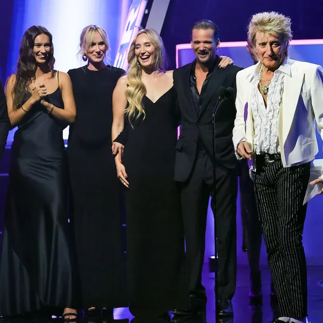 Rod Stewart smiling with his signature spiky hair style
