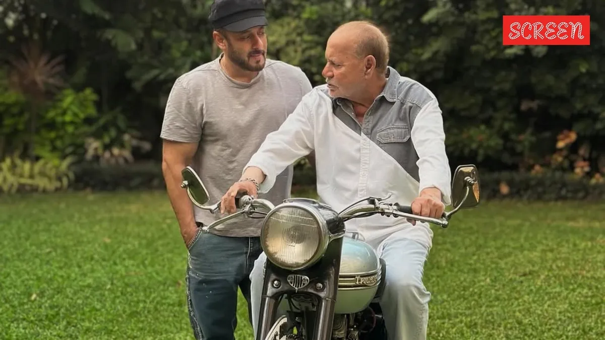Salman Khan and Salim Khan smiling together.