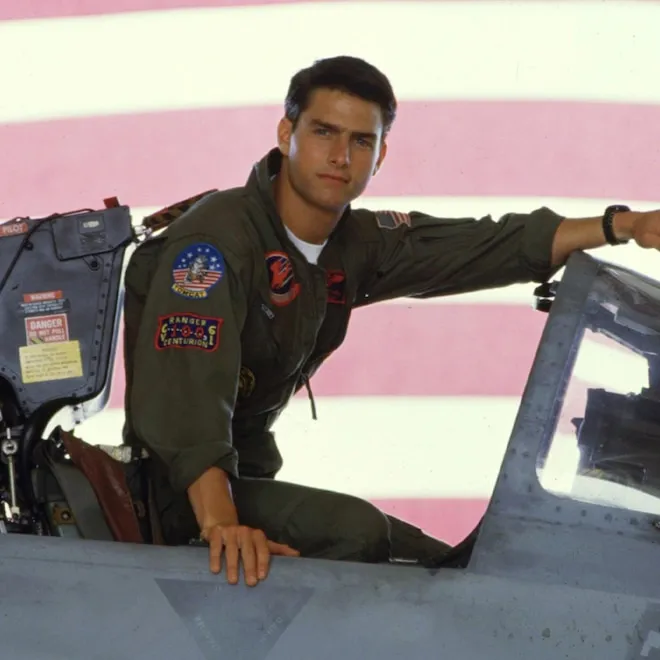 A side-by-side comparison of a young Tom Cruise as Maverick in Top Gun and a recent photo of him.