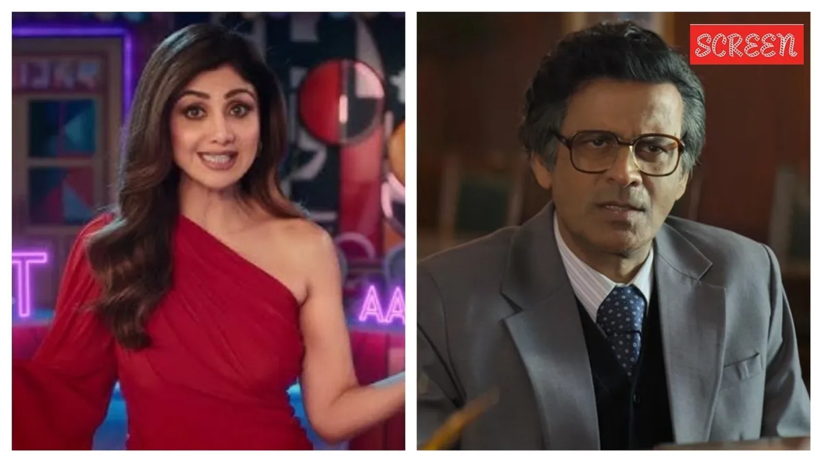 Shilpa Shetty and Manoj Bajpayee looking intense in a scene from the 'Maa Hai Na' trailer, possibly in a kitchen and office setting.