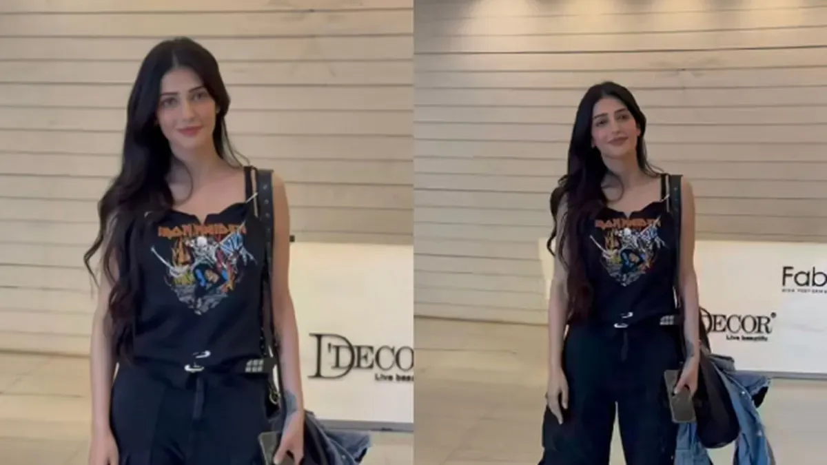 Shruti Haasan wearing a black sleeveless Iron Maiden graphic t-shirt.