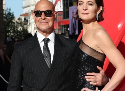 Stanley Tucci and Felicity Blunt smiling together.