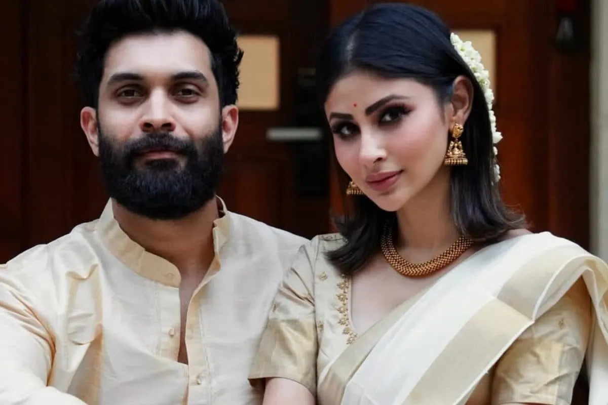 Mouni Roy and Suraj Nambiar looking happy together at an event