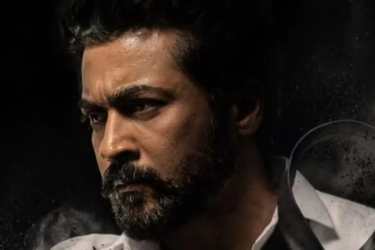 Suriya and Trisha Krishnan in a poster for the fantasy action film Karuppu, showing a dark and mystical aesthetic.